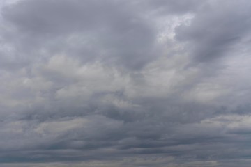 Dark clouds overcast the sky before the rain. Dramatic pre-storm view of the sky.