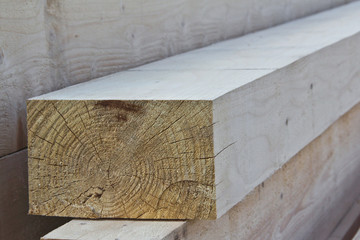 Boards as material for construction. frame construction of the building. Construction of the house from a tree.