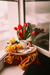 bouquet of roses on wooden table