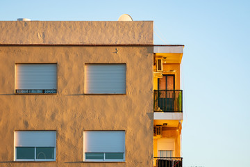 Top floor apartament building in sunset light