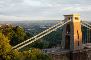 The famous Clifton Suspension bridge seen in the daytime, with the city stretching below it