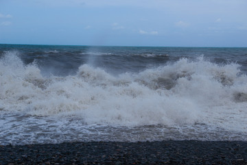 Stormy sea waves breaking near the coast