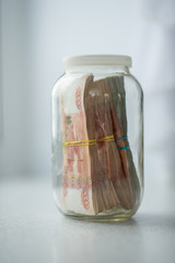 Russian money in glass jar