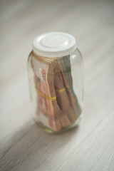 Russian money in glass jar