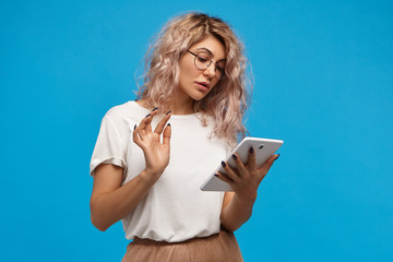 Modern technology, electronic gadgets, devices and lifestyle concept. Portrait of fashionable...