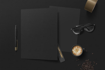 blank folder and sheet of paper with sunglass and coffee