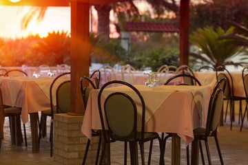 Outdoor restaurant at sunset