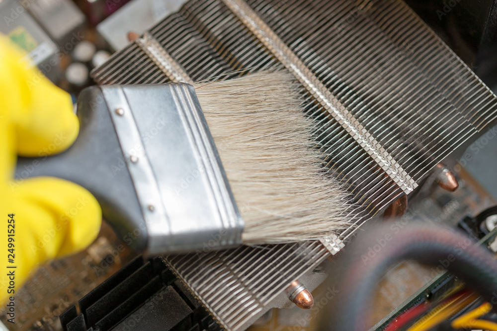 Aufkleber desktop computer dust cleaning with tassel. cpu cooling radiator system with dust and web.