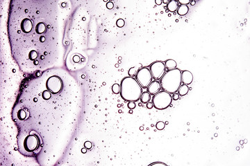 clear texture of purple bubbles on a light background