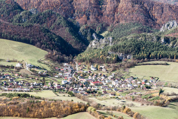 Fototapeta na wymiar Sulov village from Kecka hill in autumn Sulovske skaly mountains in Slovakia