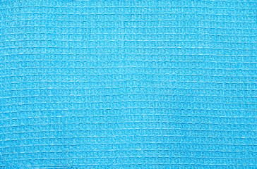Textile abstract background of blue color. Image for background, design. Close-up. Soft focus.