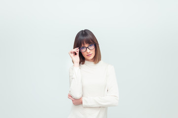 Portrait of beautiful woman in eyeglasses in office company