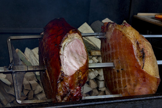 Meat on turnspit and wooden logs