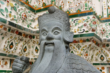 Obraz premium Statue of Giant at Wat Arun. Wat Arun or Temple of the Dawn is one of a famous Buddhist temple in the Bangkok, Thailand