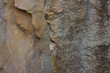 Granite rocks with blurred background. Granite close up. Texture of the stone. Natural material background