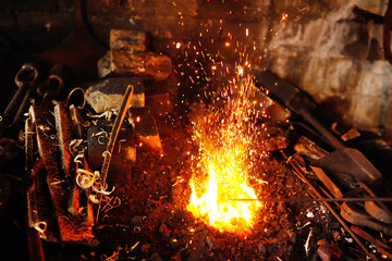 blacksmith tools in a hot oven close-up