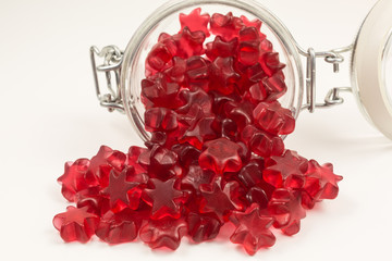 star shaped gummy candy with mulled wine flavor in a glass jar