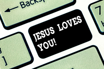 Handwriting text writing Jesus Loves You. Concept meaning Believe in the Lord To have faith religious demonstrating Keyboard key Intention to create computer message pressing keypad idea