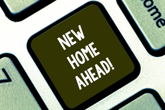 Text sign showing New Home Ahead. Conceptual photo Buying an own house apartment Real estate business Relocation Keyboard key Intention to create computer message pressing keypad idea