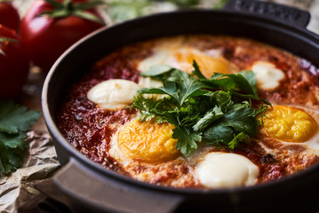 Pan of Fried Eggs with Tomatoes, Sweet Peppers and Coriander