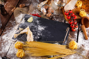 ingredients for pasta With tomato sauce and Parmesan