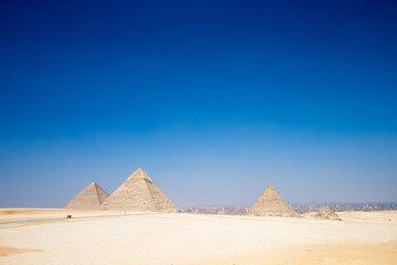 Fototapeta na wymiar pyramids with a beautiful sky of Giza in Cairo, Egypt.