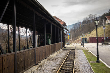 Old railroad station with narrow gauge railway track, popular tourist attraction known as sarganska...