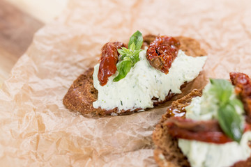 Bruschetta with cheese cream and tomatoes