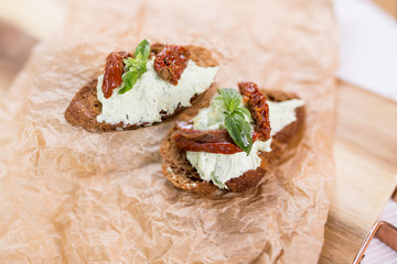 Bruschetta with cheese cream and tomatoes