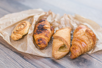 Fresh croissants on paper 