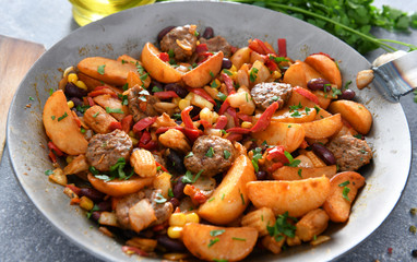 Vegetables from the pan with meat chunks
