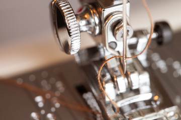 Sewing machine with thread in needle details