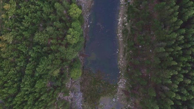 Aerial drone view of a shallow lake inside a small canyon (Tirpentwys and Blaencuffin, Wales)