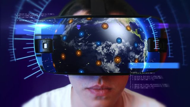 Young man wearing VR headset and experiencing virtual reality. Technology related digital earth network concept. Seamless Loop.