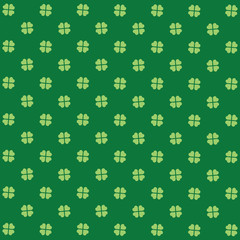 Green seamless pattern with clovers, shamrock leaves for St. Patrick's Day. Holiday symbol