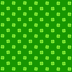 Green seamless pattern with clovers, shamrock leaves for St. Patrick's Day. Holiday symbol