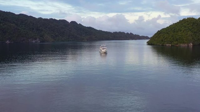 Aerial View of Calm Water and Yacht in Raja Ampat, Indonesia