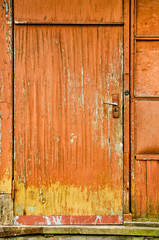 old weathered orange door