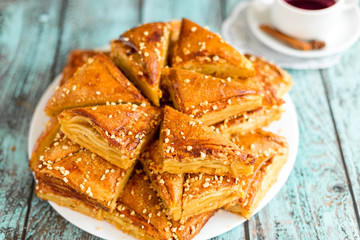 Homemade cookies with nuts on wooden background