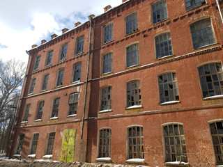 Old architectural plant. Old abandoned red brick factory.Ancient construction.