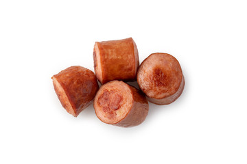 Fried slices of sausages on white isolated background