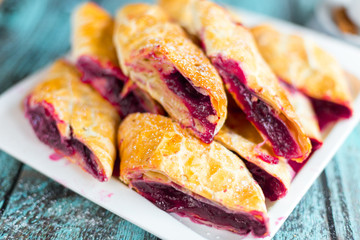 Sweeet tasty baked cakes and cookies on plate. Dessert, sugar, breakfast concept