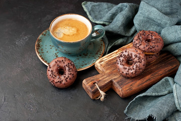 Tasty sweet donuts  and coffee mug