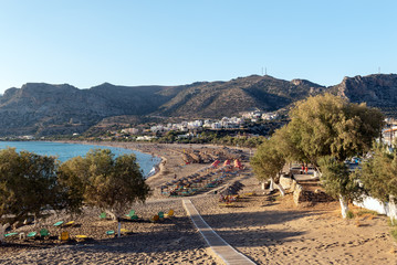 Wooden pathway to sandy beach at Palaiochora town at southern part of Crete island, Greece