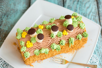 Delicious cake with coffee latte on wooden table