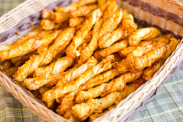Cheese chips on plate. Baked tasty snack, food photo concept