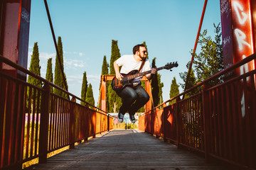 outdoor photo session with a bass player and his instruments