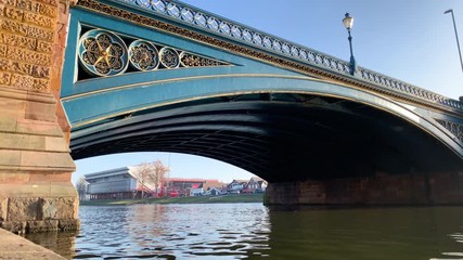 Trent Bridge, in Nottingham, with a view of Nottingham Forest football stadium behind. 4K. Slider shot.