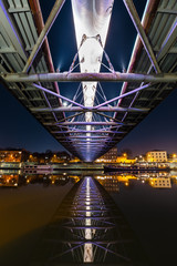 Bernatka footbridge over Vistula river at night, Krakow, Poland