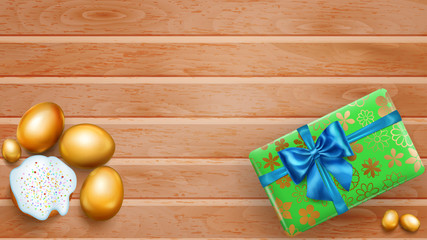 Realistic golden Easter eggs, tasty cake and beautiful gift box with bow on wooden planks